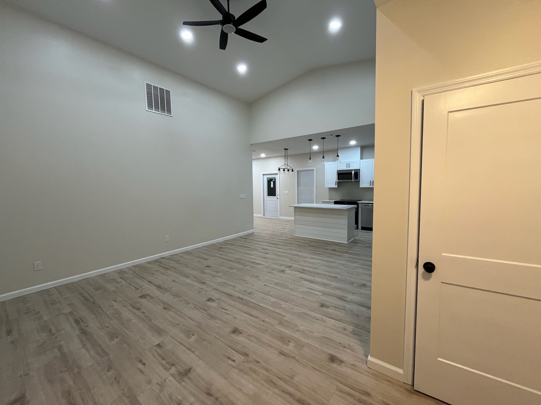 White farmhouse open living room and kitchen
